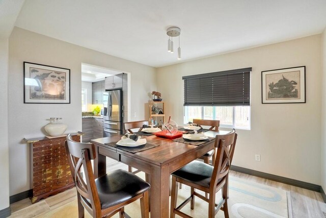 3332 Heather Ridge Ct, San Marcos, CA 92078 - dining room with baseboards and light wood-style flooring