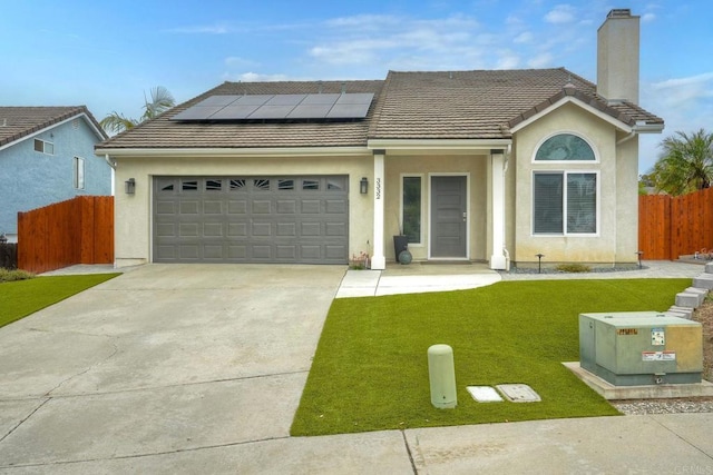 3332 Heather Ridge Ct, San Marcos, CA 92078 - ranch-style home featuring a chimney, driveway, solar panels, an attached garage, and a tile roof