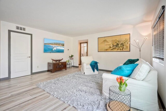 3332 Heather Ridge Ct, San Marcos, CA 92078 - living room featuring wood finished floors and baseboards