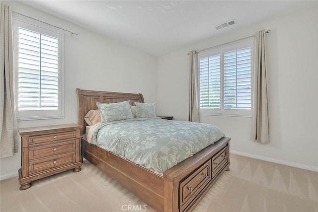 13029 Waterlily Way, Chino, CA 91710 - bedroom featuring light colored carpet and multiple windows
