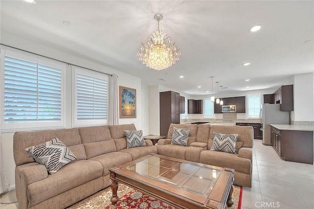 13029 Waterlily Way, Chino, CA 91710 - living area featuring a chandelier, recessed lighting, and light tile patterned floors