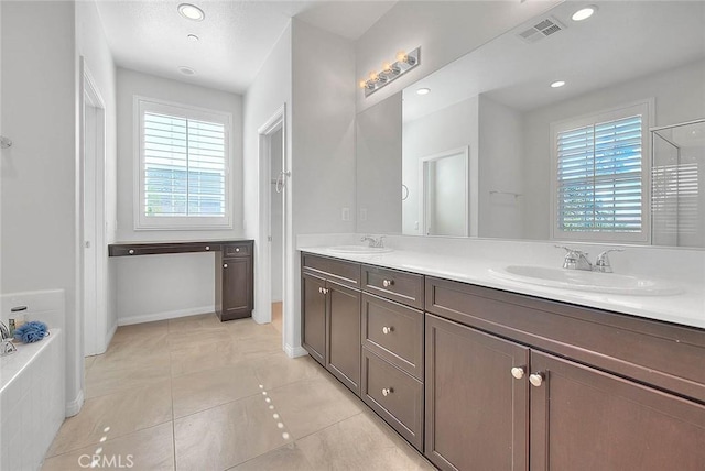 13029 Waterlily Way, Chino, CA 91710 - full bath with plenty of natural light, double vanity, tile patterned flooring, recessed lighting, and a bath