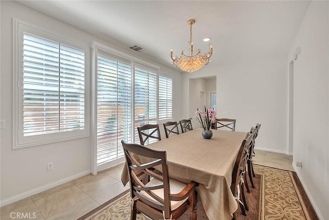 13029 Waterlily Way, Chino, CA 91710 - dining area featuring a chandelier and light tile patterned flooring