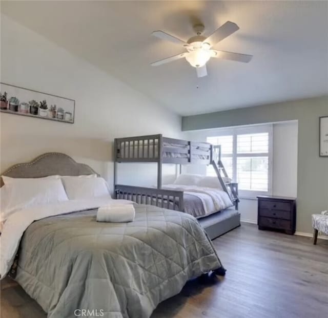 43300 Warner Trl, Palm Desert, CA 92211 - bedroom featuring wood finished floors, lofted ceiling, baseboards, and a ceiling fan