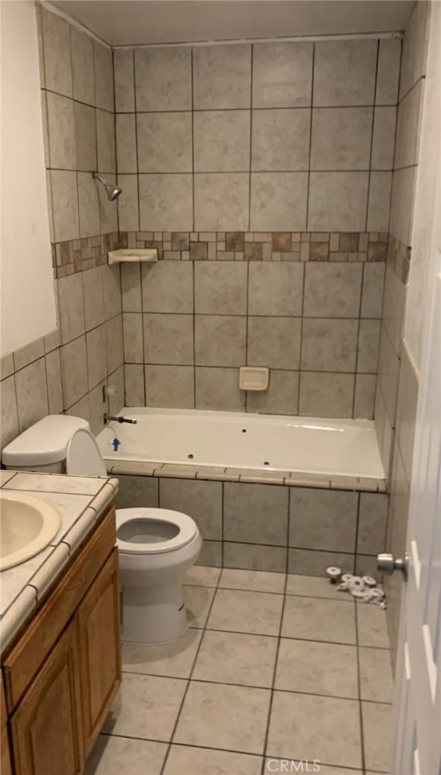17506 Sandlake Ave, Carson, CA 90746 - full bath featuring vanity, tile patterned floors, tiled shower / bath, and tile walls