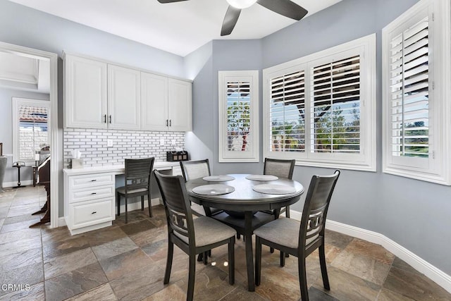 12428 Palmer Dr, Moorpark, CA 93021 - dining room with stone tile floors, ceiling fan, and built in study area
