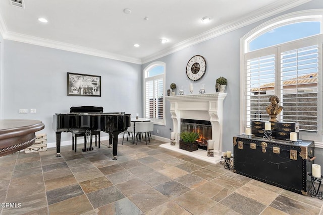 12428 Palmer Dr, Moorpark, CA 93021 - living area featuring ornamental molding, stone tile flooring, a glass covered fireplace, and recessed lighting