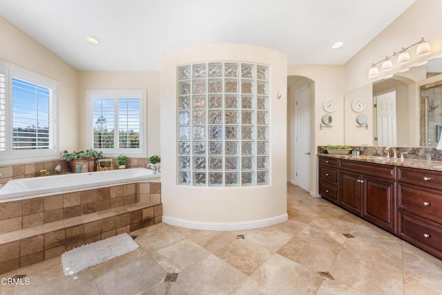 12428 Palmer Dr, Moorpark, CA 93021 - full bathroom with vanity, a bath, a tile shower, and tile patterned floors