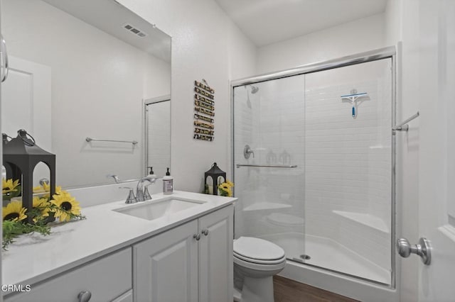 275 Fuerte Dr, Santa Paula, CA 93060 - full bathroom with a shower stall, vanity, and wood finished floors