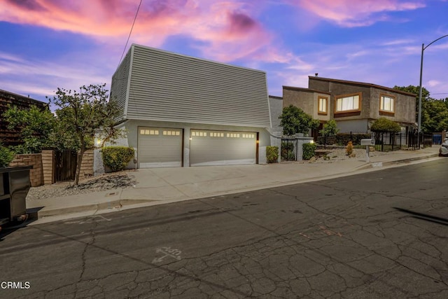 22769 Macfarlane Dr, Woodland Hills, CA 91364 - view of front of property with a garage and concrete driveway