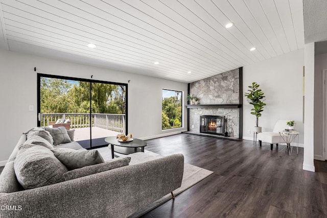 22769 Macfarlane Dr, Woodland Hills, CA 91364 - living room featuring dark wood-style flooring, a fireplace, recessed lighting, and wooden ceiling