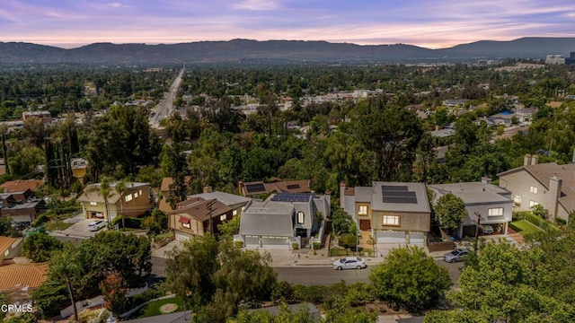 22769 Macfarlane Dr, Woodland Hills, CA 91364 - aerial view at dusk of a mountain view and a residential view