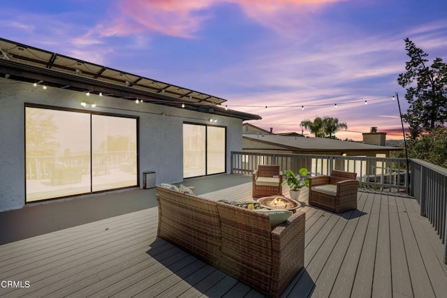22769 Macfarlane Dr, Woodland Hills, CA 91364 - deck at dusk featuring an outdoor hangout area