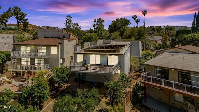 22769 Macfarlane Dr, Woodland Hills, CA 91364 - rear view of property featuring a balcony and stucco siding
