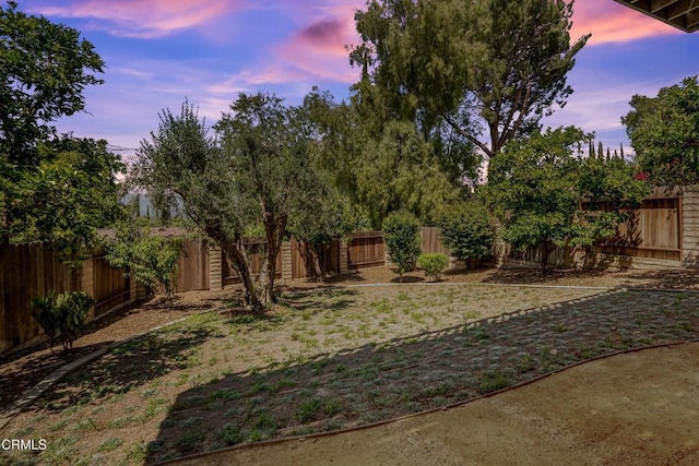 22769 Macfarlane Dr, Woodland Hills, CA 91364 - yard at dusk with a fenced backyard