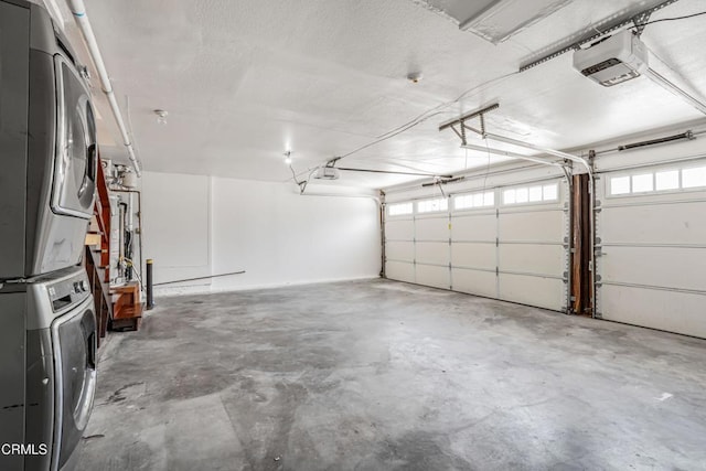 22769 Macfarlane Dr, Woodland Hills, CA 91364 - garage featuring stacked washer / dryer and a garage door opener