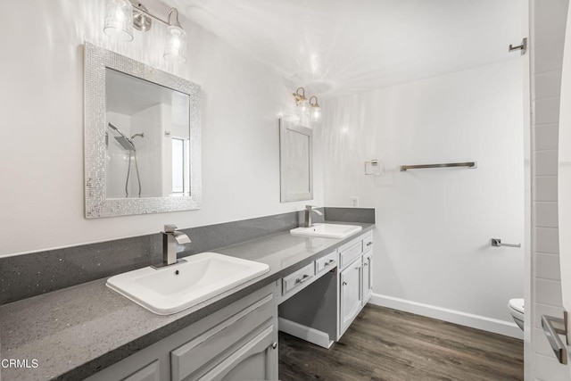 22769 Macfarlane Dr, Woodland Hills, CA 91364 - full bath featuring double vanity, wood finished floors, and a shower