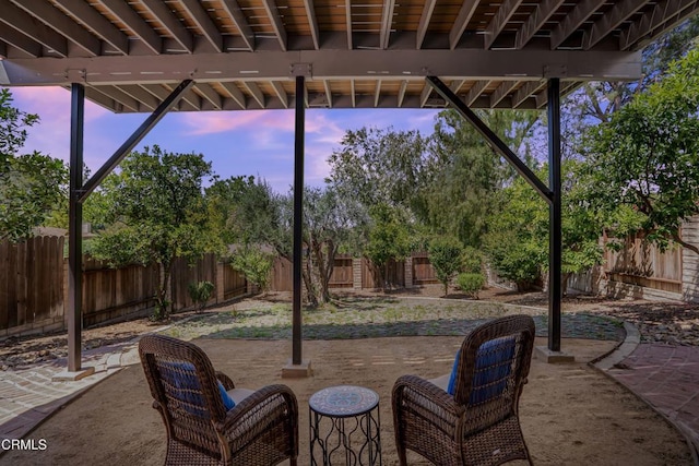 22769 Macfarlane Dr, Woodland Hills, CA 91364 - patio terrace at dusk with a fenced backyard and a patio area