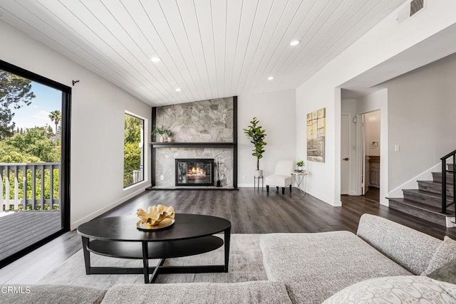 22769 Macfarlane Dr, Woodland Hills, CA 91364 - living area featuring recessed lighting, wood finished floors, wood ceiling, a large fireplace, and stairway