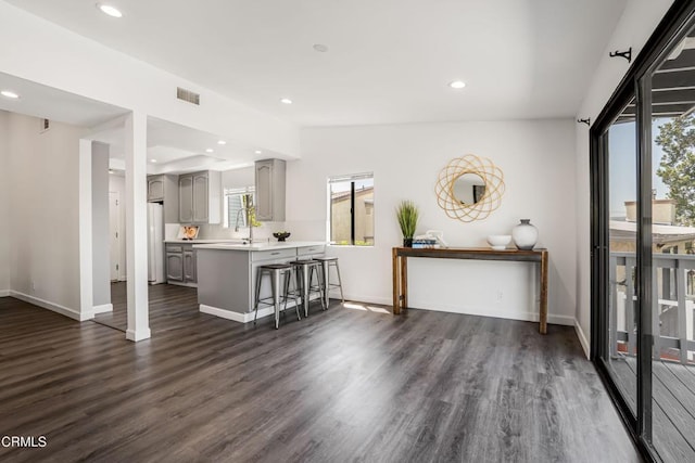 22769 Macfarlane Dr, Woodland Hills, CA 91364 - living area featuring dark wood finished floors and recessed lighting