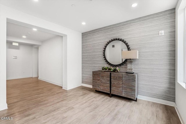 2830 Wagon Wheel Rd Unit 304, Oxnard, CA 93036 - hall featuring an accent wall, recessed lighting, wood finished floors, and wallpapered walls