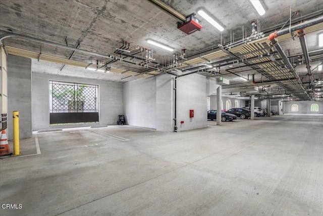 2830 Wagon Wheel Rd Unit 304, Oxnard, CA 93036 - parking deck featuring a garage door opener