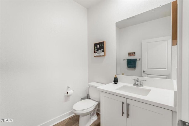 2830 Wagon Wheel Rd Unit 304, Oxnard, CA 93036 - half bathroom featuring wood finished floors and vanity