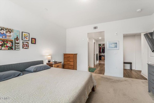 2830 Wagon Wheel Rd Unit 304, Oxnard, CA 93036 - bedroom with wood finished floors and baseboards