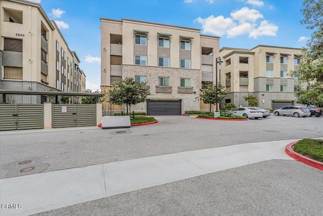 2830 Wagon Wheel Rd Unit 304, Oxnard, CA 93036 - view of property featuring uncovered parking