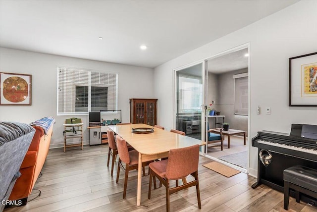 2830 Wagon Wheel Rd Unit 304, Oxnard, CA 93036 - dining room featuring light wood-type flooring and recessed lighting