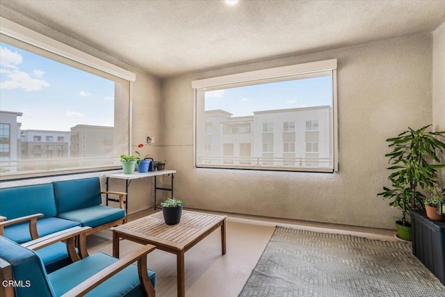 2830 Wagon Wheel Rd Unit 304, Oxnard, CA 93036 - living area featuring a textured wall