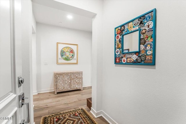 2830 Wagon Wheel Rd Unit 304, Oxnard, CA 93036 - hall with wood finished floors and recessed lighting