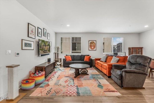 2830 Wagon Wheel Rd Unit 304, Oxnard, CA 93036 - living area featuring wood finished floors and recessed lighting