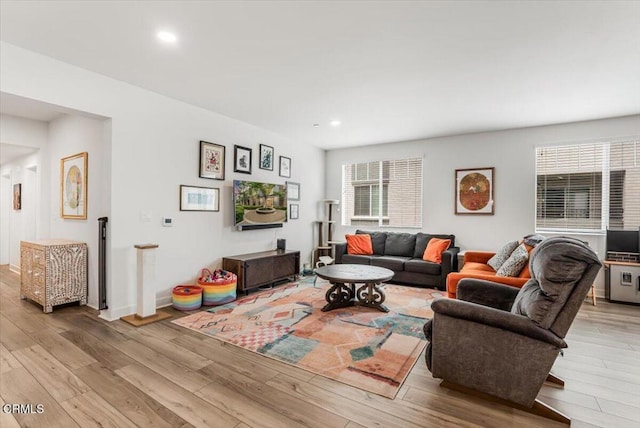 2830 Wagon Wheel Rd Unit 304, Oxnard, CA 93036 - living area with light wood-style flooring and recessed lighting