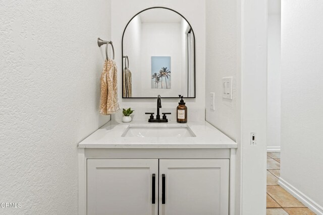 5222 Whitecap St, Oxnard, CA 93035 - bathroom featuring vanity, a textured wall, and tile patterned flooring