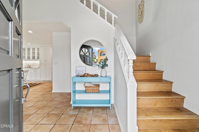 5222 Whitecap St, Oxnard, CA 93035 - staircase with tile patterned flooring, recessed lighting, and a high ceiling
