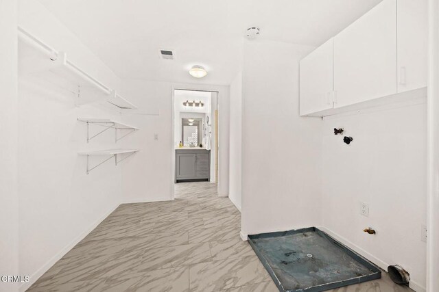 477 S Euclid Ave Unit A, Pasadena, CA 91101 - washroom with light marble finish floors and baseboards