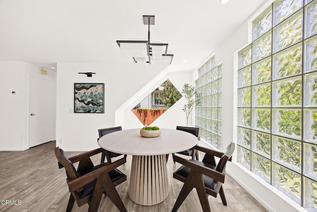477 S Euclid Ave Unit A, Pasadena, CA 91101 - dining room featuring wood finished floors, recessed lighting, and a chandelier