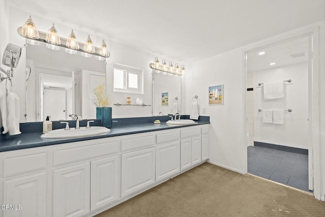 477 S Euclid Ave Unit A, Pasadena, CA 91101 - bathroom featuring double vanity, tile patterned flooring, and a shower