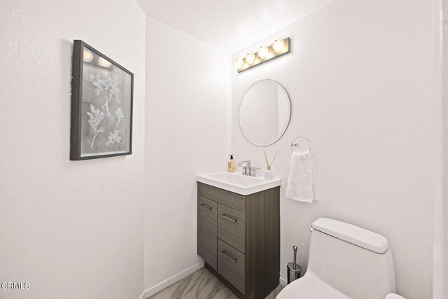 477 S Euclid Ave Unit A, Pasadena, CA 91101 - bathroom featuring vanity and marble look tiles