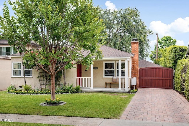 2250 Cooley Pl, Pasadena, CA 91104 - view of front facade featuring stucco siding, covered porch, a front lawn, a chimney, and a gate