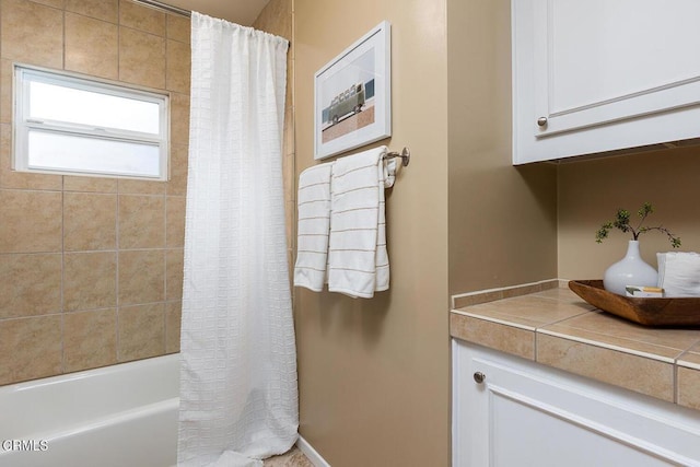2250 Cooley Pl, Pasadena, CA 91104 - bathroom featuring shower / bath combination with curtain and vanity