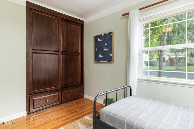2250 Cooley Pl, Pasadena, CA 91104 - bedroom featuring light wood-style flooring and crown molding