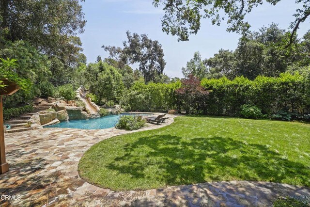 1550 Scenic Dr, Pasadena, CA 91103 - swimming pool with a yard and a patio area