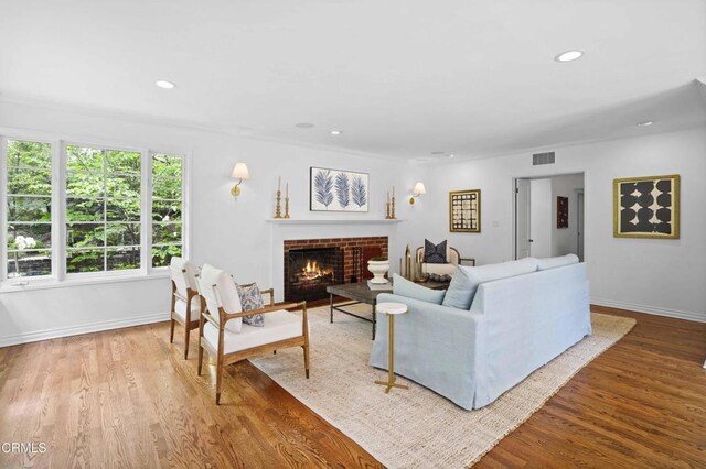1550 Scenic Dr, Pasadena, CA 91103 - living room featuring a brick fireplace, recessed lighting, and wood finished floors