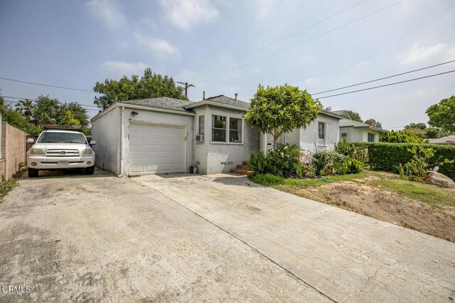 15207 Lorne St, Panorama City, CA 91402 - single story home featuring an attached garage, concrete driveway, and stucco siding