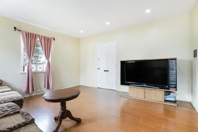 15207 Lorne St, Panorama City, CA 91402 - living area featuring wood finished floors and recessed lighting