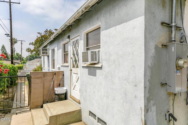 15207 Lorne St, Panorama City, CA 91402 - view of side of property featuring stucco siding and cooling unit
