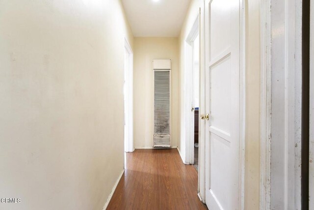 15207 Lorne St, Panorama City, CA 91402 - corridor with a heating unit and dark wood-type flooring