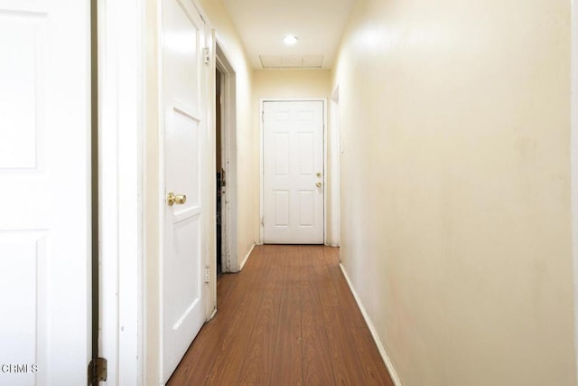 15207 Lorne St, Panorama City, CA 91402 - hallway featuring dark wood-style flooring and baseboards